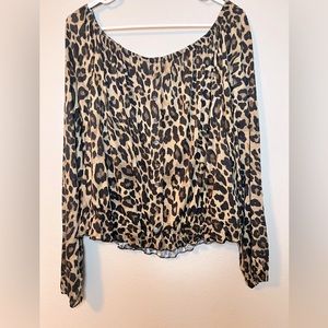 Womens leopard blouse slightly off the shoulder size Large.